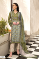 A woman models a traditional three-piece suit set in olive green, featuring intricate floral prints, beige trousers, and a matching dupatta, set against a modern architectural background with a black and white checkered floor. | Wholesale Olive Green Ethnic Muslin Suit Set | Sri Fashion