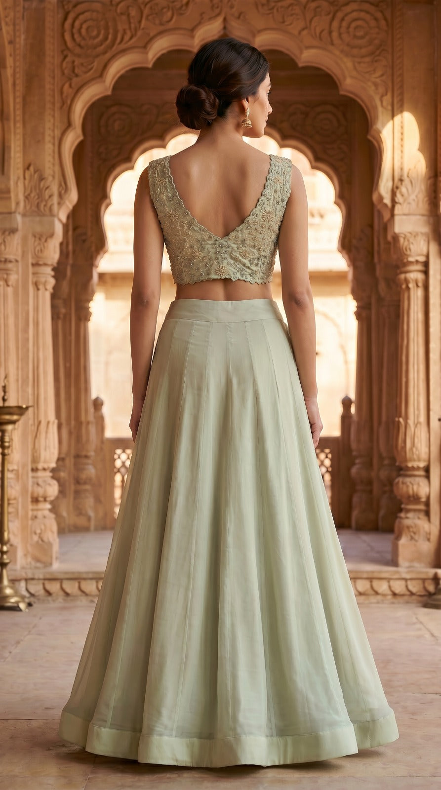 Sage Green Silk Embroidered Sleeveless Lehenga Set with Floral Waist Accent